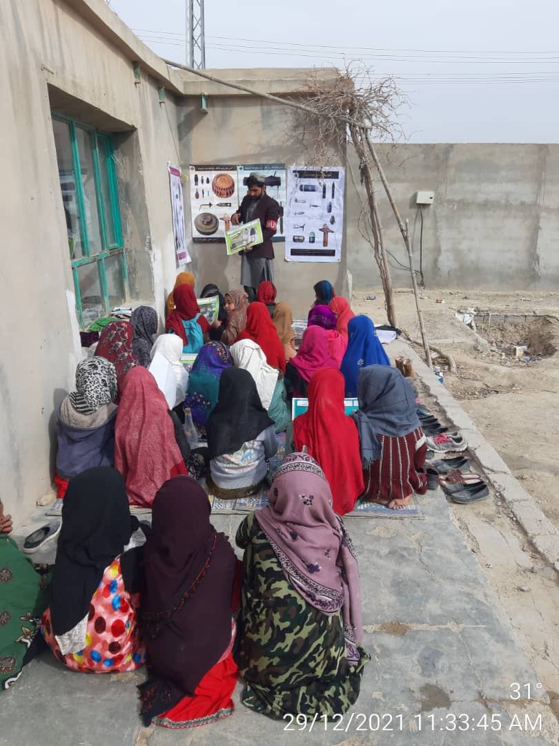 An MCPA educator delivering an explosive ordnance risk education session to children