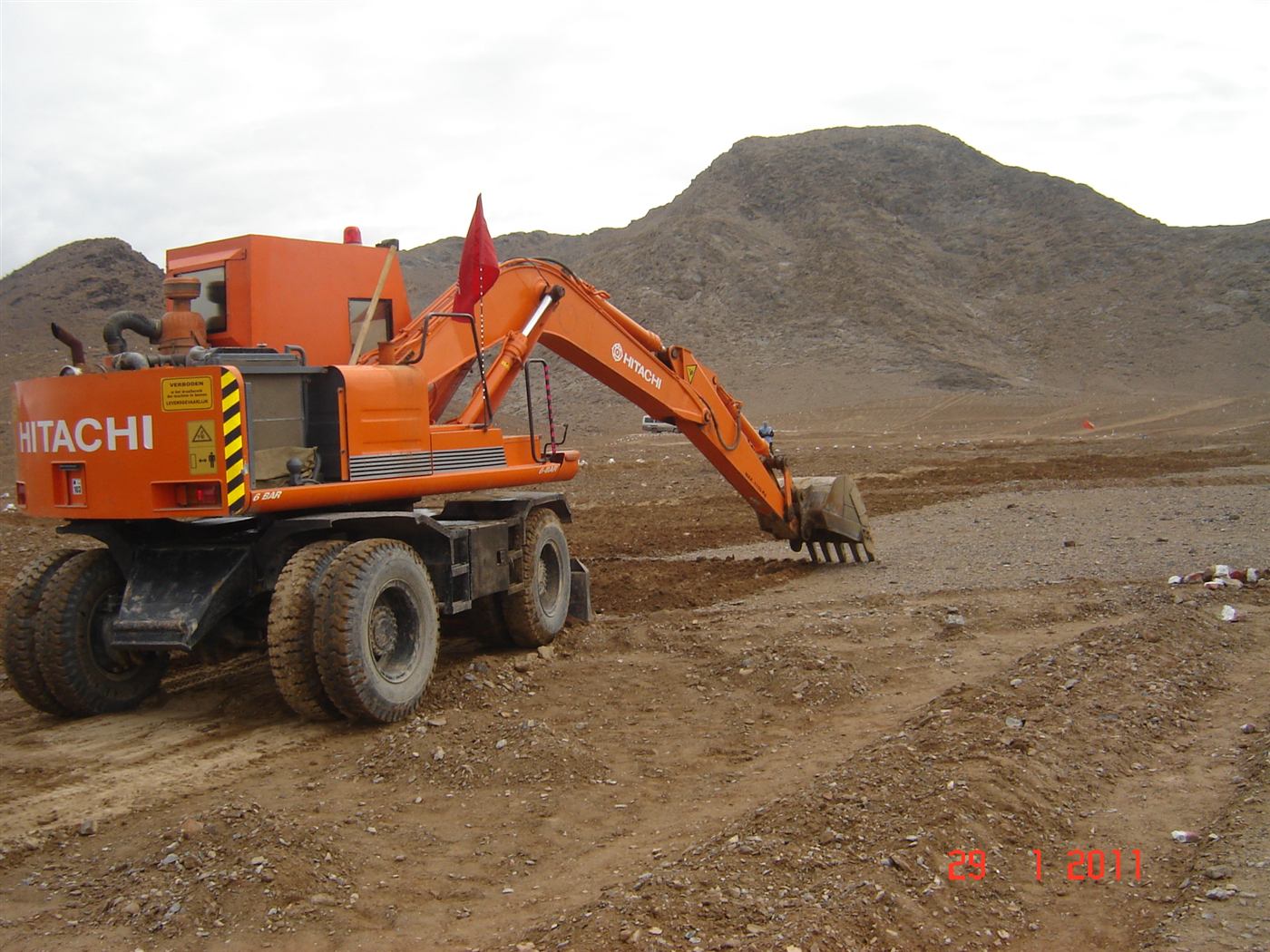A mechanical demining unit excavator preparing contaminated ground